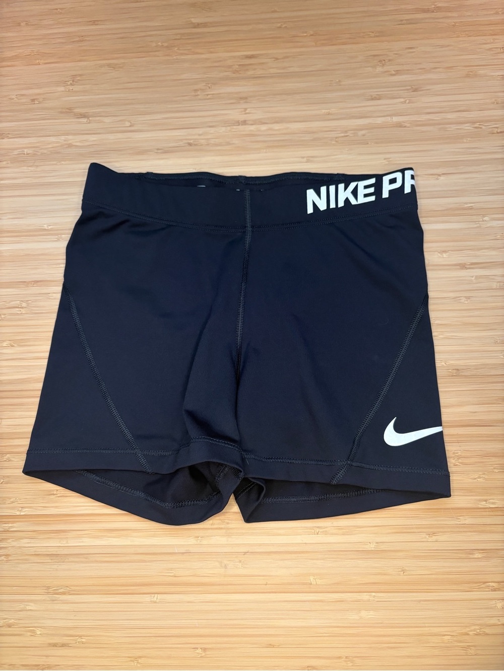 Nike Black Compression Workout Shorts with White Swoosh